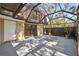 The patio is spacious with neutral flooring and access to the home, perfect for outdoor entertaining at 2722 11Th Ct # 50A, Palm Harbor, FL 34684