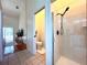 Bright bathroom with a glass enclosed shower stall at 2752 Cypress Dr, Clearwater, FL 33763