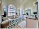 Primary bathroom suite features a soaking tub with a large window and granite countertops at 2752 Cypress Dr, Clearwater, FL 33763