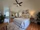 Spacious main bedroom offers ample space with stylish accents and access to an ensuite bath at 2752 Cypress Dr, Clearwater, FL 33763