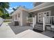 Backyard patio area with white fencing surrounding the property at 3906 W De Leon St, Tampa, FL 33609