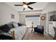 This bedroom has light-colored walls, a ceiling fan, and modern flooring at 3906 W De Leon St, Tampa, FL 33609