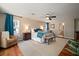 This bedroom has wood floors, stylish decor, and an attached bathroom at 3906 W De Leon St, Tampa, FL 33609