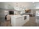 Open concept living area with a large island and lots of living space at 3906 W De Leon St, Tampa, FL 33609