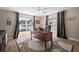 The office has two large windows, neutral walls, and light, modern flooring at 3906 W De Leon St, Tampa, FL 33609