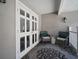 Inviting patio with seating area and views of the garden at 3906 W De Leon St, Tampa, FL 33609