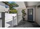 Inviting porch with seating area and shade at 3906 W De Leon St, Tampa, FL 33609