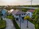 Stunning aerial view of waterfront home, showcasing lush landscaping and proximity to the water at 3924 N Ridge Ave, Tampa, FL 33603