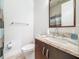 Bright bathroom with a granite vanity top, modern fixtures, and plenty of counter space at 3924 N Ridge Ave, Tampa, FL 33603