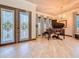 Inviting foyer with tile floors, a stained glass front door, and a grand piano at 3924 N Ridge Ave, Tampa, FL 33603