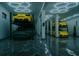 A car collector's dream garage featuring car lifts and custom lighting at 3924 N Ridge Ave, Tampa, FL 33603