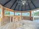 Charming gazebo with a built-in bar, seating, and plenty of space for enjoying the outdoor view at 3924 N Ridge Ave, Tampa, FL 33603