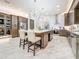 Gourmet kitchen with large island, modern lighting, stainless appliances, and ample counter space at 3924 N Ridge Ave, Tampa, FL 33603