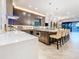 The contemporary kitchen includes sleek countertops, stainless appliances, and designer lighting at 3924 N Ridge Ave, Tampa, FL 33603