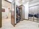 A Laundry room that provides access to the bathroom that features a soaking tub and shower at 3924 N Ridge Ave, Tampa, FL 33603