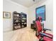 Bright office area with a stylish chair and plenty of desk and shelving space at 3924 N Ridge Ave, Tampa, FL 33603
