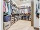 A large walk-in closet with an abundance of shelving, and a secure sentry safe at 3924 N Ridge Ave, Tampa, FL 33603