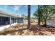 Private backyard featuring a screened-in lanai, wood shed, and space to customize your ideal outdoor retreat at 4511 Huntington Ne St, St Petersburg, FL 33703