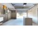 Empty two car garage with white walls and an open garage door at 4511 Huntington Ne St, St Petersburg, FL 33703