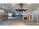 This is an image of a kitchen in progress with exposed studs and original flooring at 4511 Huntington Ne St, St Petersburg, FL 33703