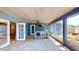 Screened-in patio boasting a vaulted ceiling, outdoor kitchen, and a seamless transition to the interior at 4511 Huntington Ne St, St Petersburg, FL 33703