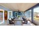 Screened patio features a vaulted ceiling and an outdoor dining table at 4511 Huntington Ne St, St Petersburg, FL 33703