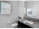 Bathroom with granite countertop vanity, sink and toilet at 4624 Willet Cooper Ct, Tampa, FL 33619