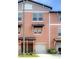 Charming two-story townhome featuring a one-car garage and well-maintained landscaping at 4624 Willet Cooper Ct, Tampa, FL 33619
