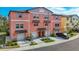 Stylish townhome with attached garages and well-manicured landscaping at 4624 Willet Cooper Ct, Tampa, FL 33619