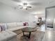 Comfortable living space adjacent to dining and kitchen areas, perfect for entertaining at 4624 Willet Cooper Ct, Tampa, FL 33619