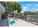 Relaxing rooftop deck with comfortable seating and scenic neighborhood views at 4815 Queen Palm Ne Ter, St Petersburg, FL 33703