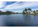 Scenic waterfront community view showcasing lush landscaping and tranquil waters at 4815 Queen Palm Ne Ter, St Petersburg, FL 33703