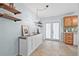 Bright kitchen featuring tile flooring, light blue walls, and a buffet at 4920 17Th N Ave, St Petersburg, FL 33710