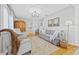 Inviting living room featuring hardwood floors, a comfortable sofa, and stylish decor at 4920 17Th N Ave, St Petersburg, FL 33710