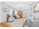 Cozy living room with hardwood floors, comfortable seating, and abundant natural light at 4920 17Th N Ave, St Petersburg, FL 33710