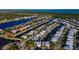 Stunning aerial view of a waterfront community with boat docks, lush landscaping, and picturesque waterways at 5603 Tybee Island Dr, Apollo Beach, FL 33572