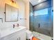 Contemporary bathroom features a walk-in shower, modern vanity, and stylish fixtures at 5603 Tybee Island Dr, Apollo Beach, FL 33572