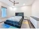 Modern bedroom features a luxurious bed, stylish decor, and sleek tile floors at 5603 Tybee Island Dr, Apollo Beach, FL 33572