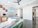 Elegant main bedroom featuring a plush bed, ambient lighting, and soothing colors for a relaxing atmosphere at 5603 Tybee Island Dr, Apollo Beach, FL 33572