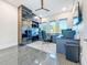 Bright office with modern built-ins, ample natural light, and sleek tile floors at 5603 Tybee Island Dr, Apollo Beach, FL 33572