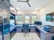 Bright office with modern built-ins, ample natural light, and sleek finishes at 5603 Tybee Island Dr, Apollo Beach, FL 33572