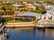 Waterfront home with a screened lanai and boat dock, ideal for enjoying waterfront living at 5603 Tybee Island Dr, Apollo Beach, FL 33572