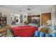 Cozy bedroom featuring a ceiling fan, tv, and a large wardrobe at 588 Bayview Dr, Longboat Key, FL 34228