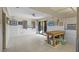 Bonus room with tile flooring, ample lighting, and access to the outdoors at 588 Bayview Dr, Longboat Key, FL 34228