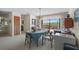 Dining room with natural light, sliding glass doors, and a view of the outdoors at 588 Bayview Dr, Longboat Key, FL 34228