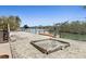 Dock with boat lift overlooking waterfront at 588 Bayview Dr, Longboat Key, FL 34228