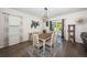 Dining area with sliding glass doors to the backyard and stylish decor at 5928 81St N Ave, Pinellas Park, FL 33781