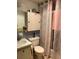 Cozy bathroom with a shower, vanity and toilet at 5940 21St N St # 11, St Petersburg, FL 33714