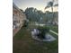 Exterior courtyard featuring green space and trees at 5940 21St N St # 11, St Petersburg, FL 33714
