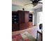 Spacious living room with stylish built-in shelving and plenty of storage at 5940 21St N St # 11, St Petersburg, FL 33714